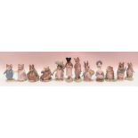 A collection of twelve Beswick Beatrix Potter for F. Warne & Co Ltd figures with gilt back stamps