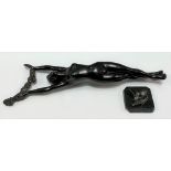 Art Deco bronzed spelter nude female holding aloft a floral garland, the base signed Limousin,