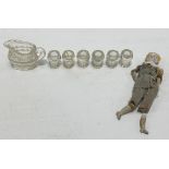 A miniature porcelain head doll with cloth body and bisque limbs, height 10cm; together with a