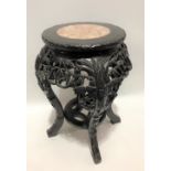 Chinese hardwood circular two-tier stand with pink marble inset, the circular top over cabriole legs