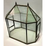 A large glazed brass framed terrarium of architectural form, width 45cm