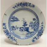 18th Century Chinese blue and white export dish decorated with a pagoda lake landscape within a