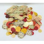 Quantity of bone stained and natural gaming counters, circular and rectangular.