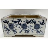 Chinese blue and white underglaze porcelain rectangular section jardinière, the sides foliate