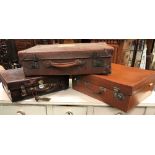 Three leather suitcases