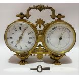 A gilt spelter cased double drum head clock barometer, with white enamel three inch dials, the