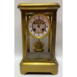 A two train, four glass clock, the four inch white enamel recess dial with roman numerals and