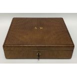 An Edwardian tooled leather writing box by W. Leuchars, maker, 38, Piccadilly, London, the brown