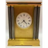A brass cased mantle clock by Looping, the 4 inch signed enamel dial with roman numerals, the