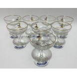 A set of eight Babycham glasses; together with a Beswick Pottery bluebird wall plaque No.706.