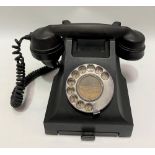 Vintage Bakelite GPO FWR dial telephone with tray under.