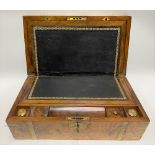 Victorian walnut brass bound writing slope hinged to reveal a black gilt tooled leather inset and