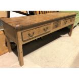 Georgian pine dresser base with three frieze drawers and on square section legs, height 65cm x width