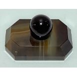 Agate desk ink blotter with ball finial, width 6.5cm.