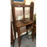 A 19th Century table press in pine, fruitwood and elm, width 82cm
