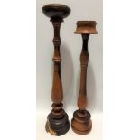 Two turned amboyna floor standing ashtrays, the tallest 67cm