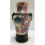 A Chinese crackle glaze famille rose baluster vase painted in enamels with figures in a garden