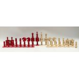 19th Century turned natural and red stained bone barleycorn pattern chess set, the largest height