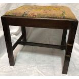 19th Century mahogany stool with woolwork tapestry drop-in seat raised on chamfered supports