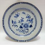 18th Century Chinese export large blue and white underglaze dish, the well decorated with blossoming