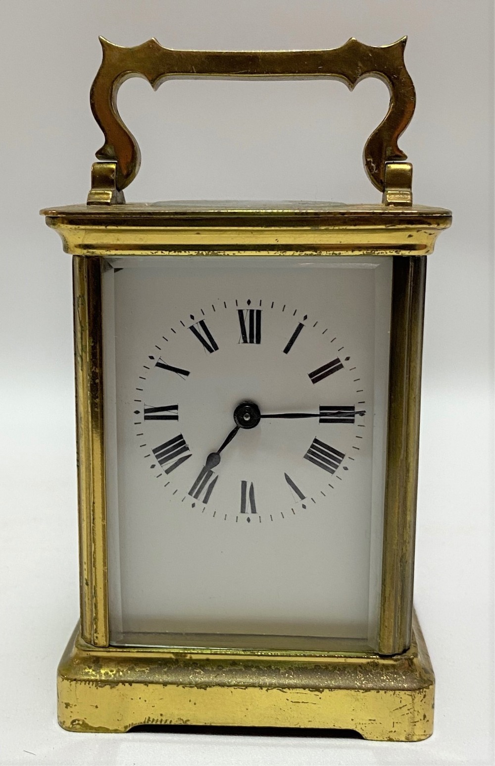 A French brass cased carriage timepiece by Duverdrey & Bloquel, the 2.25in white enamel dial with