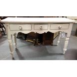 19th Century Cornish white painted pine serving table with three frieze drawers and with shaped