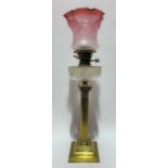 Brass Corinthian column oil lamp with cranberry blush etched glass shade and with cut glass