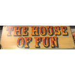 Painted circus sign 'The House of Fun', width 100cm