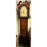 Oak cased eight day longcase clock, with 12in painted arched dial and within an oak case with swan