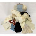 A wicker box containing antique lace, a 19th century bonnet, a Victorian silk bodice, a cream silk