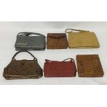 A collection of vintage leather handbags, including ostrich, python and crocodile.
