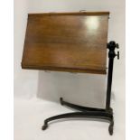 A Victorian music or reading stand with cast iron adjustable base with William Tonks & Sons, Patent,