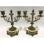 Pair of gilt metal and white alabaster twin branch candlesticks of neo-Classical design, height 24.