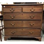 George III mahogany straight front chest of two short over three long graduated drawers upon bracket