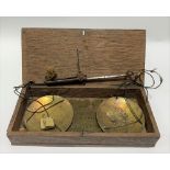 Pair of 19th Century gold scales with gram weights and within oak box