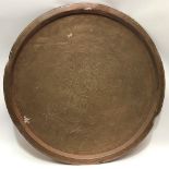 Large Indian copper engraved circular tray, diameter 64.5cm