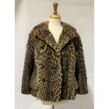 A ladies ocelot fur jacket, brown silk lining and velvet lined pockets by Femina Furs, London,