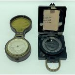 Nickel cased aneroid pocket barometer thermometer with original Moroccan leather case; together with