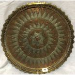 Middle Eastern brass, copper and silver applied circular tray with pierced and shaped rim,