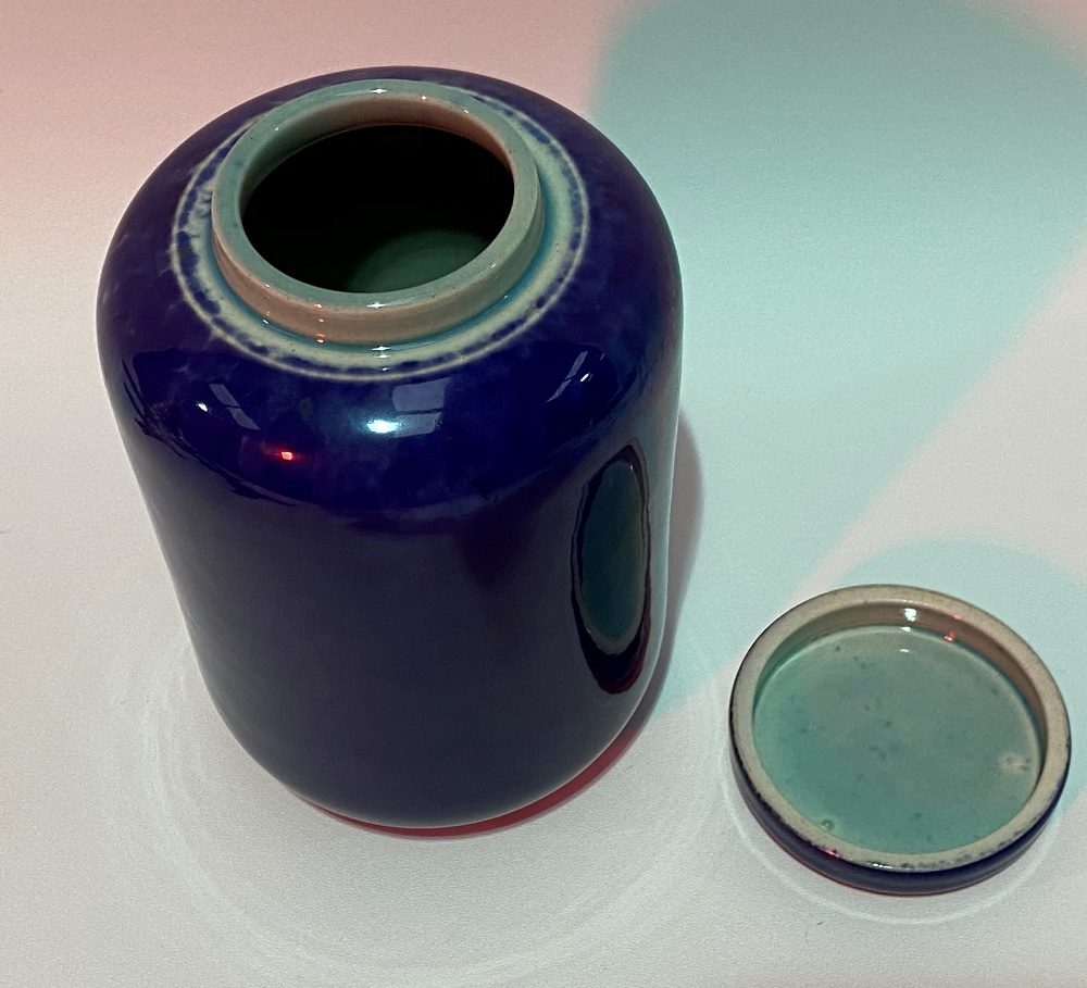 A Ruskin Pottery blue soufflé glaze cylindrical jar and cover, impressed marks to the base and No. - Image 2 of 3