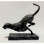 Bronze sculpture of a running cheetah monogrammed JRS and dated 2009 edition no. 28/250, height 12.