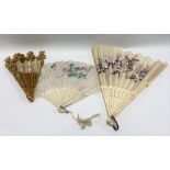 Three 19th Century fans, one with gilt wood pierced sticks and with silk painted fan, another with