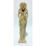Possibly ancient Egyptian faience figure modelled as a woman suckling a child, the back with