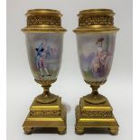 A pair of painted porcelain gilt bronze mounted pedestal garniture vases, the fluted & beaded collar