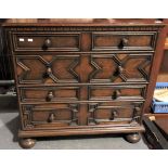 17th Century style oak chest of two short over three long drawers upon bun feet, width 80cm