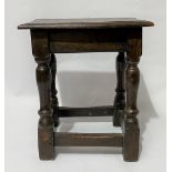 17th Century oak joint stool, the moulded rectangular top over baluster turned legs united by