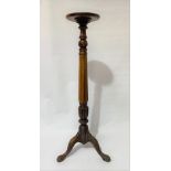 Victorian style teak carved and fluted torchere with three outswept feet