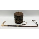 Eastern embossed metal cylindrical hinge lidded box; together with an antler handled riding crop.
