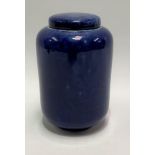 A Ruskin Pottery blue soufflé glaze cylindrical jar and cover, impressed marks to the base and No.