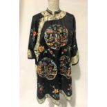 20th Century Chinese silk embroidered robe decorated with six roundels depicting figures in a